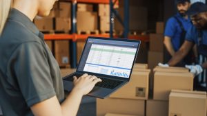 3PL centre with cardboard boxes and e-commerce online orders