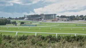 Cheltenham racecourse where many people visit Cheltenham potential for logistics near high demand market.