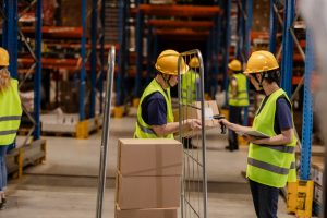 Warehouse workers doing fulfilment in Park Royal warehousing in Brent London 