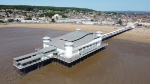Aerial View of weston super mare with warehousing in the background and road routes for fulfilment.