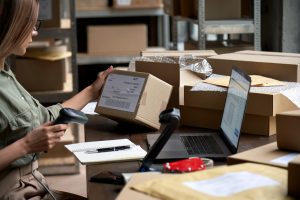 Warehouse worker doing fulfilment services such as pick and pack in Bury warehousing
