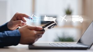 Person ordering a good from a phone with icons above showing the fulfilment process. 