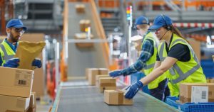 Pick and pack on conveyor belt for logistics and fulfilment inside Mansfield 3PL. 