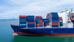 Side view of cargo ship container for Chinese freight forwarding into the UK.