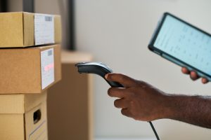 Barcodes on parcels being scanned to keep invenotry management up to date.