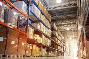 Interior of warehousing with large amount of space for racked pallet storage.