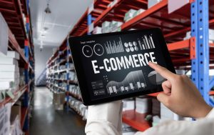 A pad with eCommerce written on it to fond stock with pallet storage in the background.