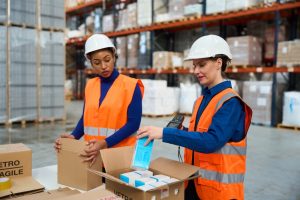 Warehouse workers in Clacton-on-Sea packing orders ready for fulfilment and distribution.