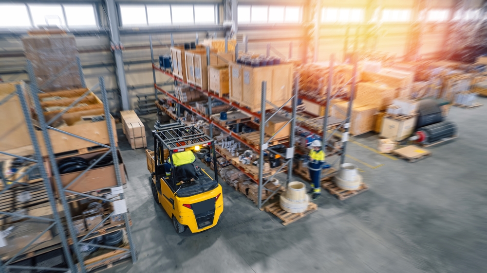 3PL in Bridgwater with a forklift moving pallet storage and onto racking systems. 