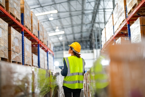 Warehouse worker in a US 3PL managing inventory.