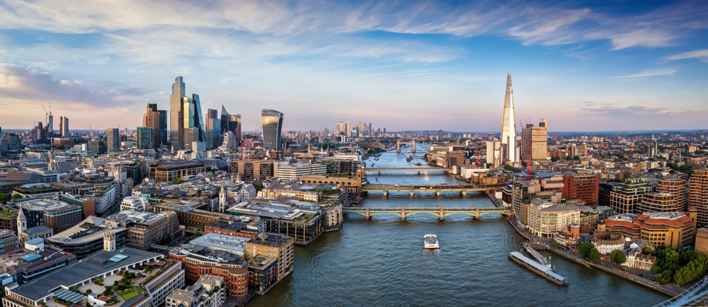 Panoramic shot of London from the Thames with warehousing and 3PLs on either side.