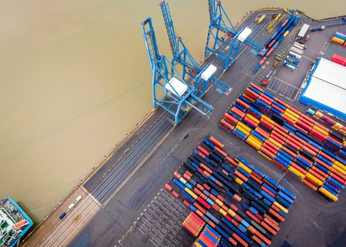 Solent Port with containers and cranes for port centric logistics.